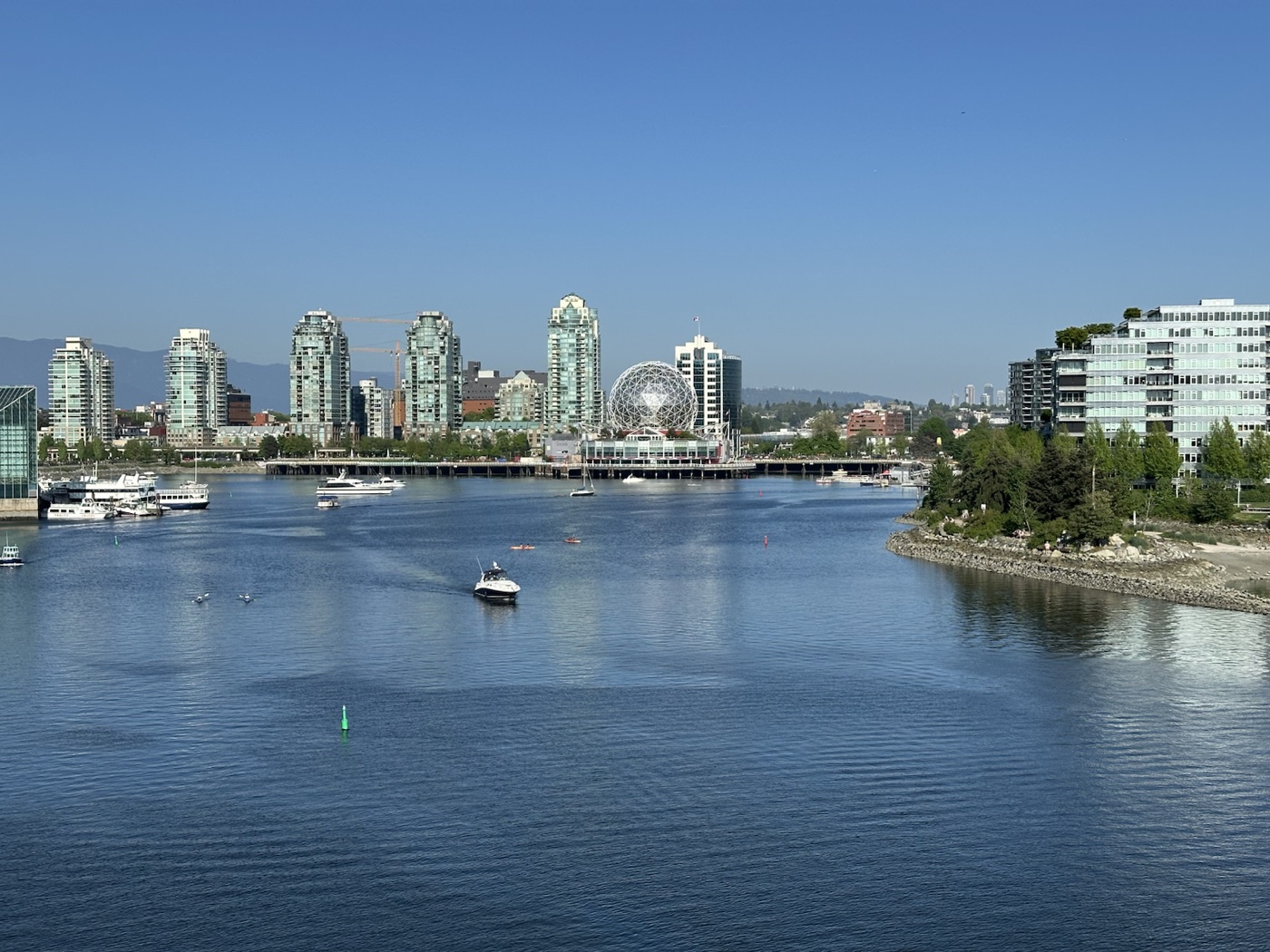 False Creek waterfront with Science World and Vancouver buildings